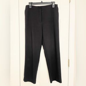 High waisted, wide leg ankle length black trousers from Loft with side pockets.